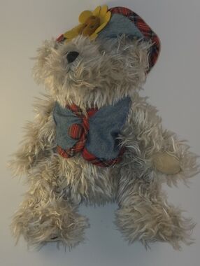 Plush Beige Teddy Bear with Denim Vest and Plaid Trim